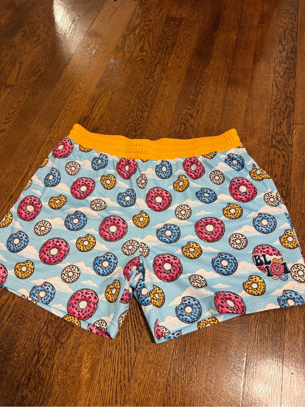 Men's Light Blue Donut Print Athletic Shorts with Yellow Waistband